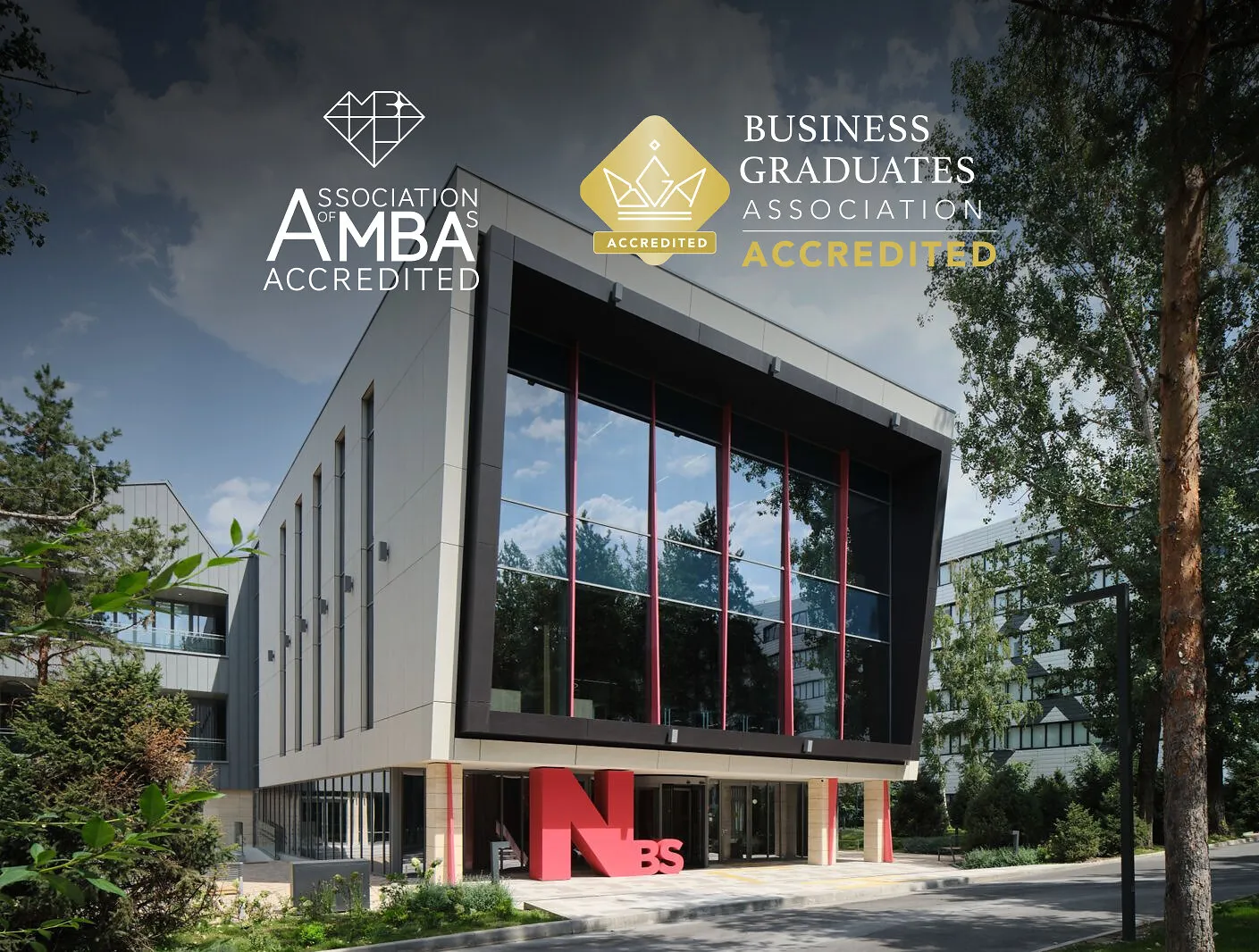 Business school building with AMBA and Business Graduates Association accredited logos.