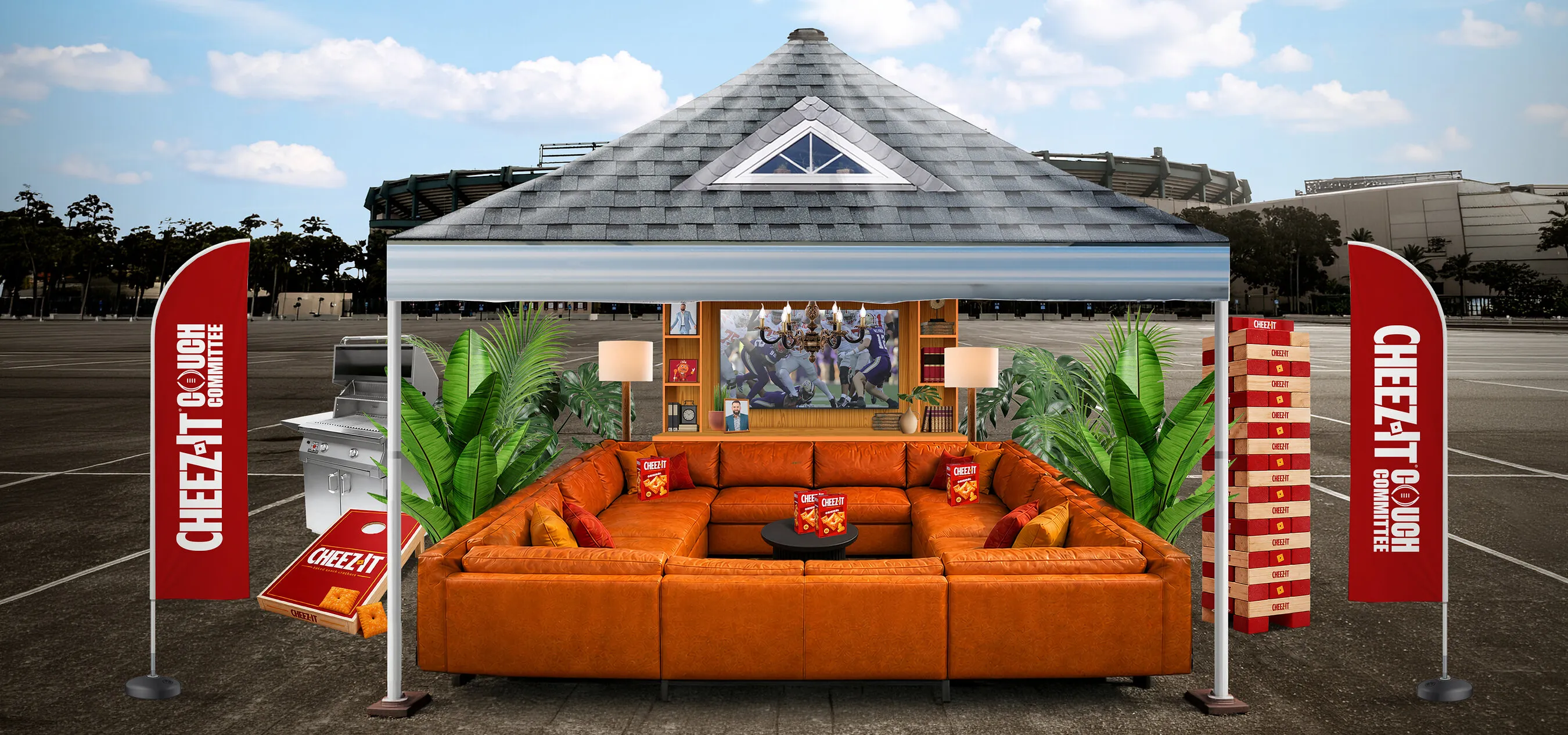 Cheez-It branded outdoor lounge with orange sectional sofa, snacks, plants and banners.